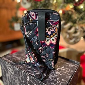 This is a smartphone wristlet in Felicity Paisley.